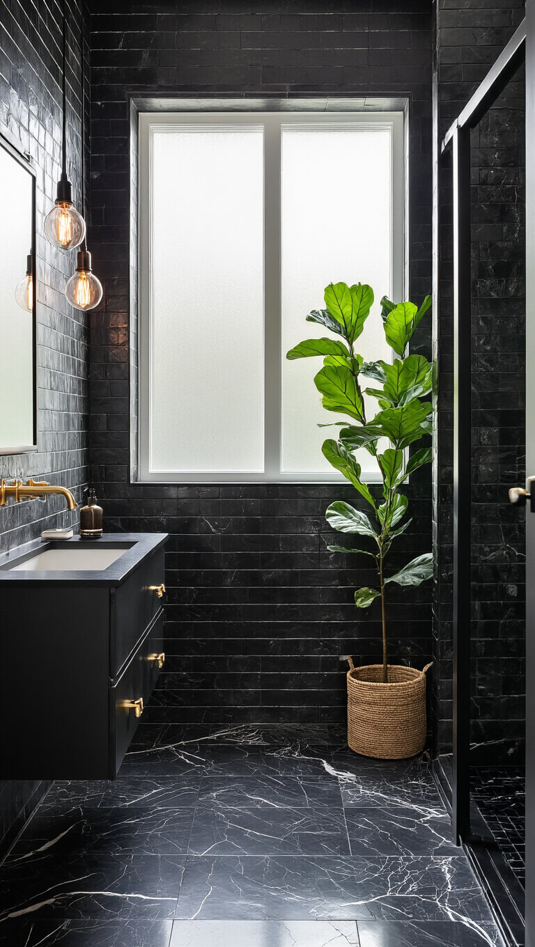 Luxurious black bathroom with floating matte vanity, gold accents, marbled porcelain floors, pendant lights, and natural morning light.